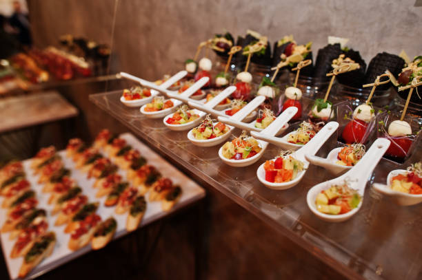 istock Dessert table of delicious snacks on wedding reception. 1208625701