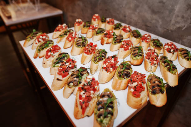 istock Dessert table of delicious snacks on wedding reception. 1208626235