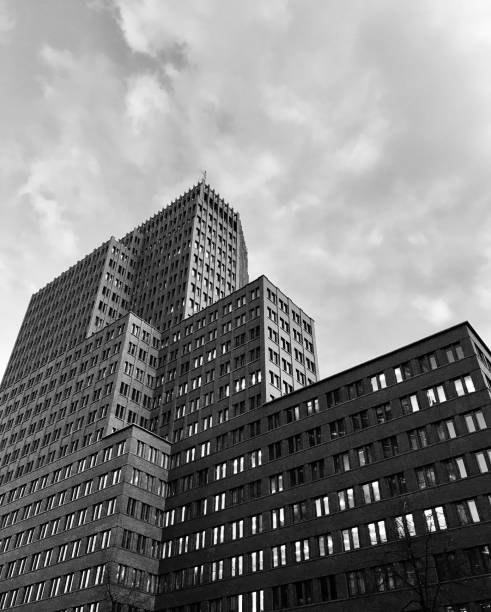 istock A high rise modern architectural building black and white photo 1208626272