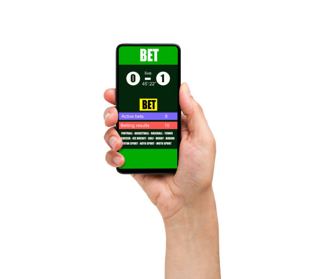 istock a mobile phone shows a betting application with live results and updates with white background 1208626658