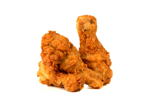 istock Fried legs on a white background. Chicken legs deep fried close-up. 1208630968