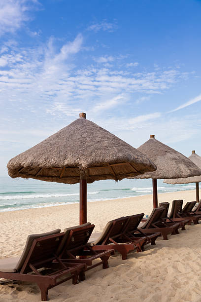 istock beach chairs and umbrellas by the sea 120863220