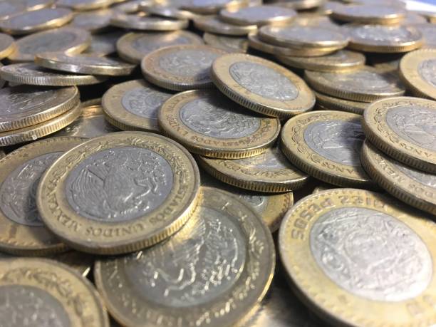 istock A lot of Mexican coins 1208638357