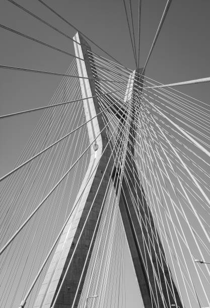 Detail of the Octavio Frias de Oliveira bridge is a cable-stayed bridge in Sao Paulo over the Pinheiros River in black and white Detail of the Octavio Frias de Oliveira bridge is a cable-stayed bridge in Sao Paulo over the Pinheiros River in black and white. cable stayed bridge stock pictures, royalty-free photos & images