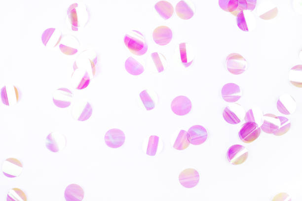 istock Pearl confetti on white background. 1208639401