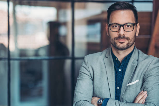 istock Businessman standing in the office 1208639798