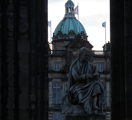 Edinburgh, UK - December 29, 2019: The Sir Walter Scott statue inside the Scott Monument in a cloudy day in Edinburgh Scotland.