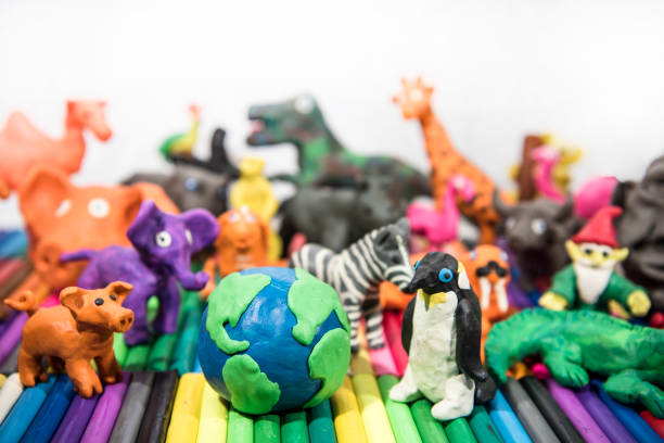 istock Animals made from Play Clay with Earth Planet in middle. 1208641342