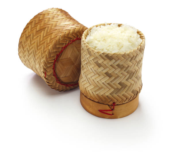istock steamed sticky rice is in bamboo container ; thai laos food 1208642064