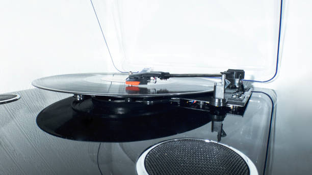istock Vinyl turntable on a white background. Retro audio equipment for vinyl disk. 1208643176