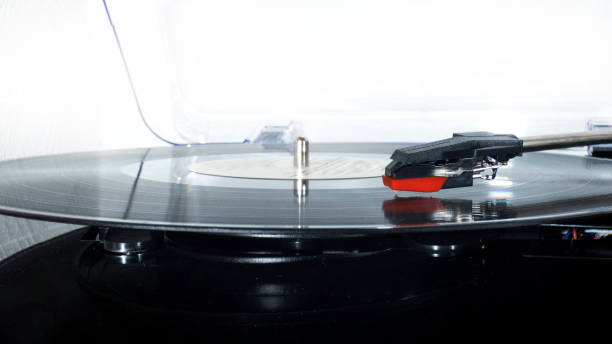 istock Vinyl turntable on a white background. Retro audio equipment for vinyl disk. 1208643311