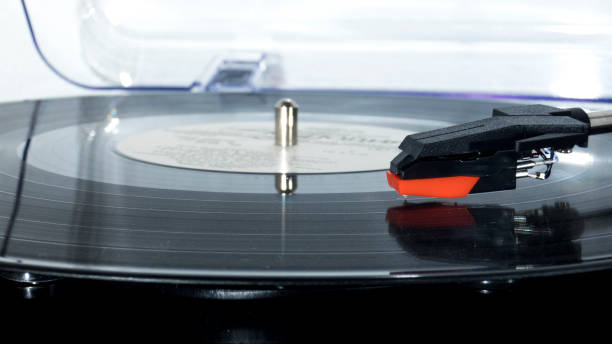 istock Vinyl turntable on a white background. Retro audio equipment for vinyl disk. 1208643405