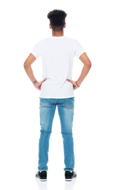 African-american ethnicity teenage boys standing in front of white background wearing shirt Full length of aged 18-19 years old with curly hair african-american ethnicity teenage boys standing in front of white background wearing shirt with hand on hip ass boy stock pictures, royalty-free photos & images
