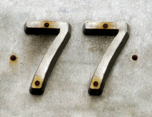 Street number iron sign  with number 77