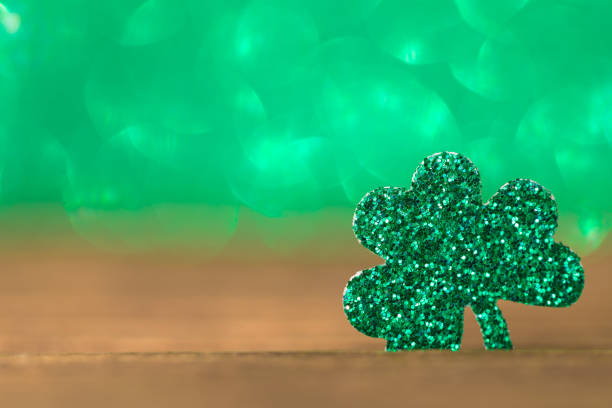 istock St Patrick's day background with shamrock clover leaf, Irish festival symbol, selective focus 1208646098