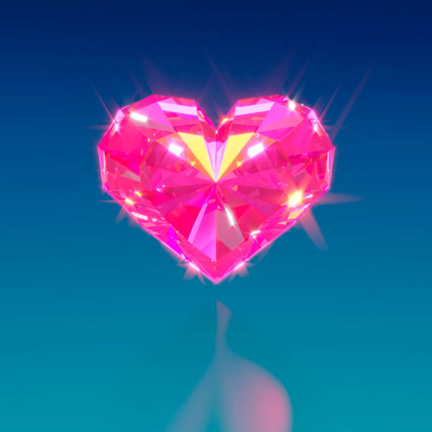 istock Ruby precious heart shimmers with light with highlights and reflections on a blue background 1208652756