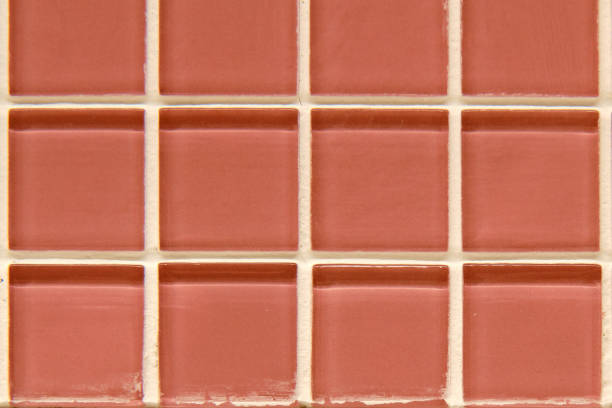 istock Square glass tile in red, close-up background 1208653056