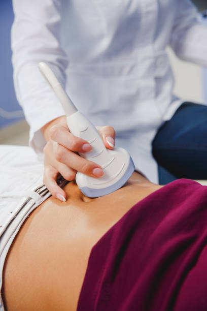 istock female doctor operating ultrasound scanner 1208655471