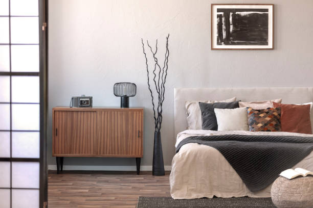 istock Trendy bedroom with comfortable king size bed in modern flat, real photo 1208657882