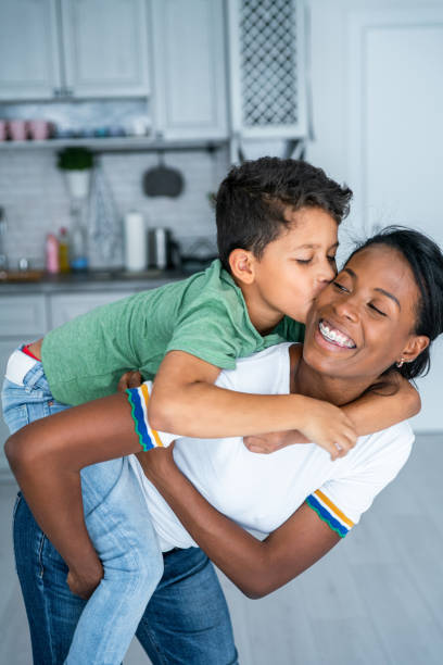 istock Mother and son at home. 1208659667