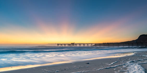 istock Sunrise Seascape and Sea Foam 1208661112