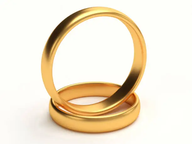 Illustration of two wedding gold rings lie on each other. 3d rendering