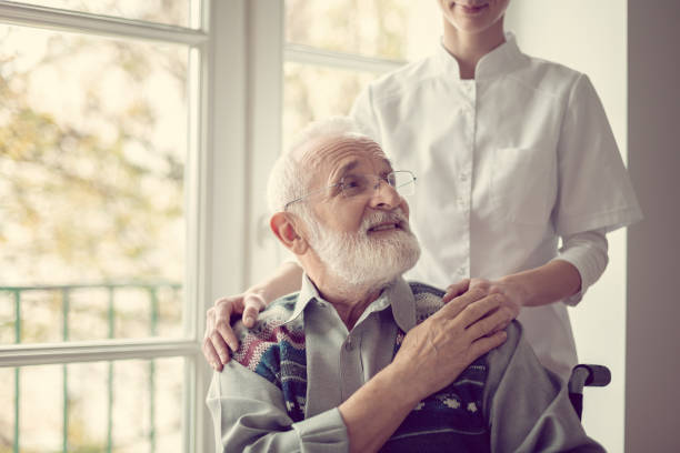 istock Man and the nurse 1208661665