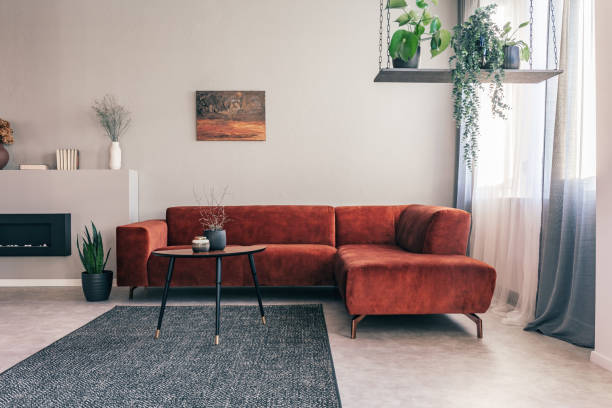 Abstract painting on empty wall of classy living room interior