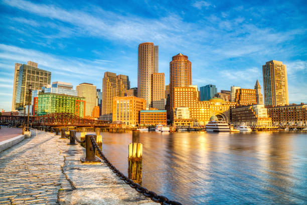 istock Boston Skyline with Financial District and Boston Harbor at Sunrise Panorama 1208671259
