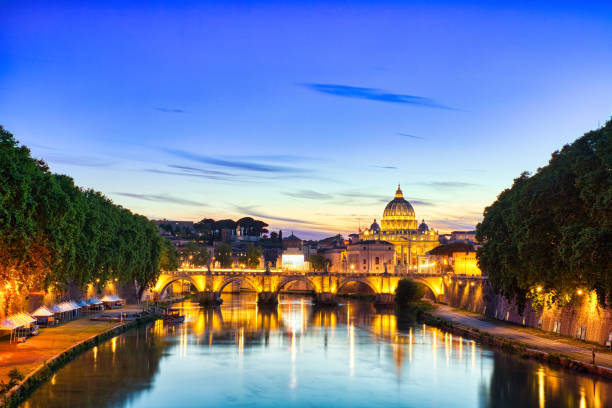 istock Illuminated St. Peter's Cathedral in Rome at Dusk 1208672162