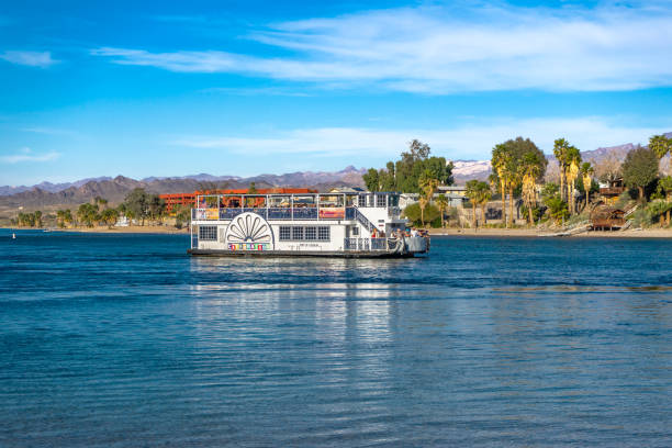 Laughlin, NV / USA – February 16, 2020: Operated by Laughlin River Tours, the Celebration River Boat tours along the Colorado River between Laughlin, Nevada and Bullhead City, Arizona.