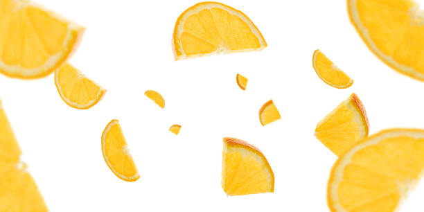 istock Tangerine fruit slice falling. Orange citrus isolated background. Fresh food concept. 1208676677