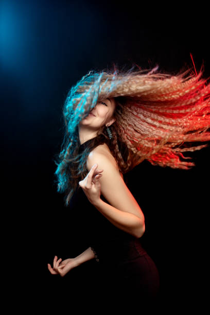 istock woman with flying hair 1208676744