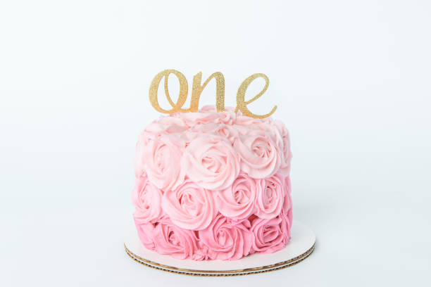 istock ombre pink first birthday cake 1208683154