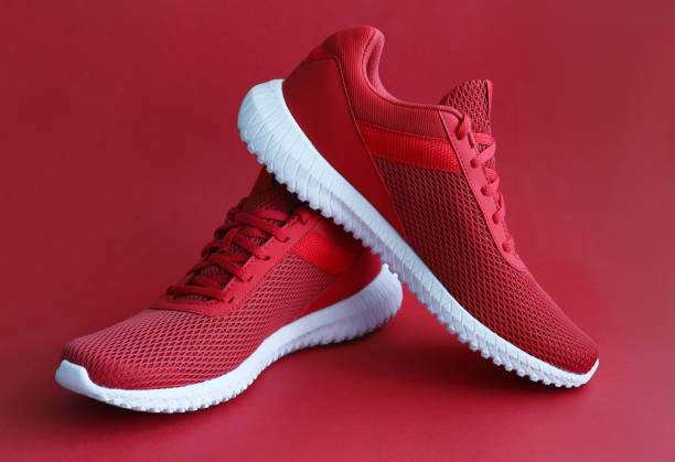 sværd Ruckus Udholde Colorful Sport Shoes On Mustard Color Backround Stock Photo - Download  Image Now - Sports Shoe, Red, Cool Attitude - iStock