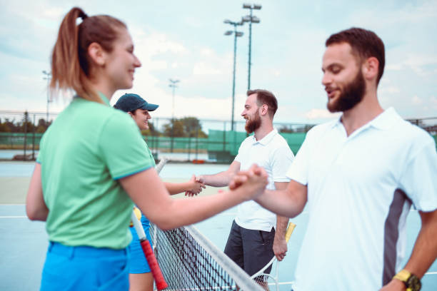 istock Friends Agreeing On Mutual Rules During Tennis Match 1208683906