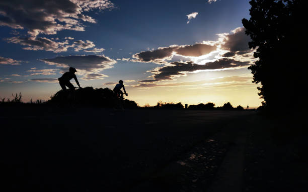 istock Cycle early morning sunrise ride with blue sky 1208686325