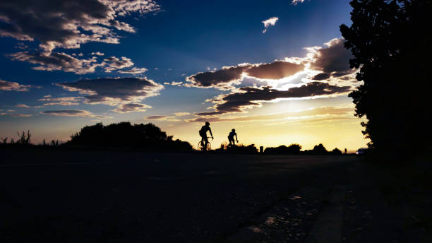 istock Cycle early morning sunrise ride with blue sky 1208686362