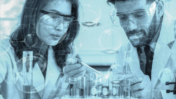 istock two researcher doing experiment in chemical laboratory 1208689346