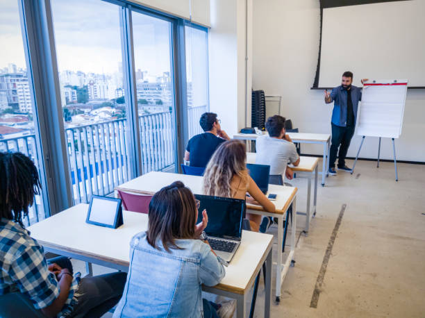 istock Group of university students at the classroom 1208691690