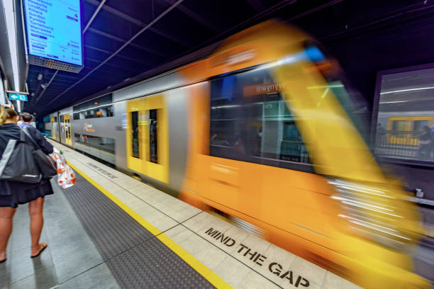 Subway station in Sydney, Australia. Tourists are walking at Subway station in Sydney, Australia. standing on subway platform stock pictures, royalty-free photos & images