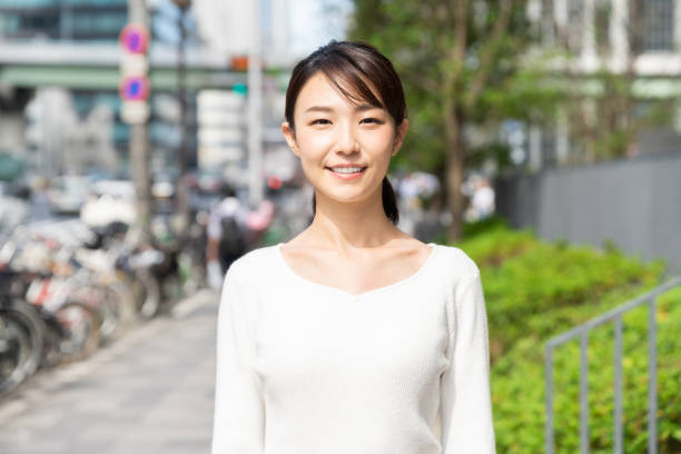 istock asian woman who smile 1208699410