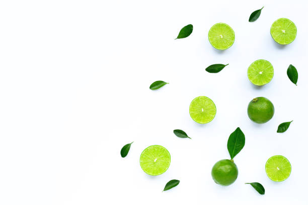 istock Limes with leaves isolated on white. 1208703506