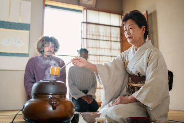 istock Japanese tea master performing a traditional Japanese tea ceremony 1208704223
