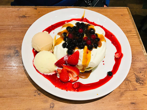 istock Mixed fruit pancake served with whipped cream and  ice cream in Japan. 1208704521