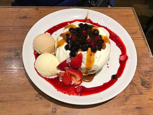 istock Mixed fruit pancake served with whipped cream and  ice cream in Japan. 1208706590