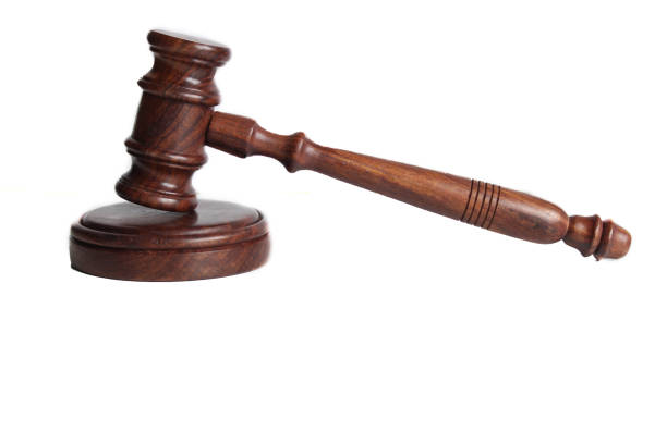 istock judge's gavel isolated on white background 1208710075