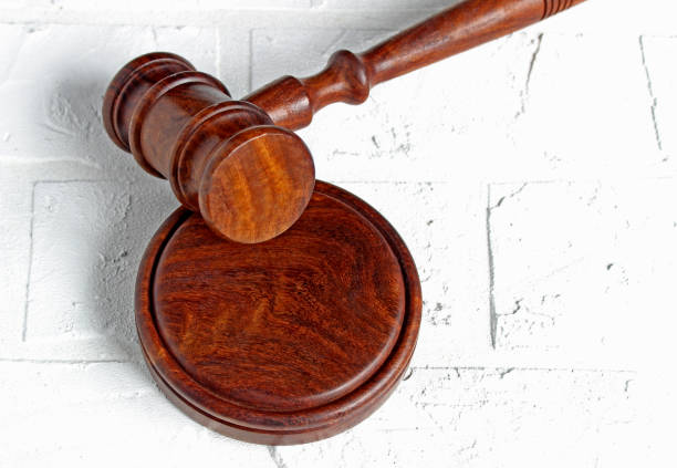 istock Judge's gavel on light background, top view. Law concept 1208710167