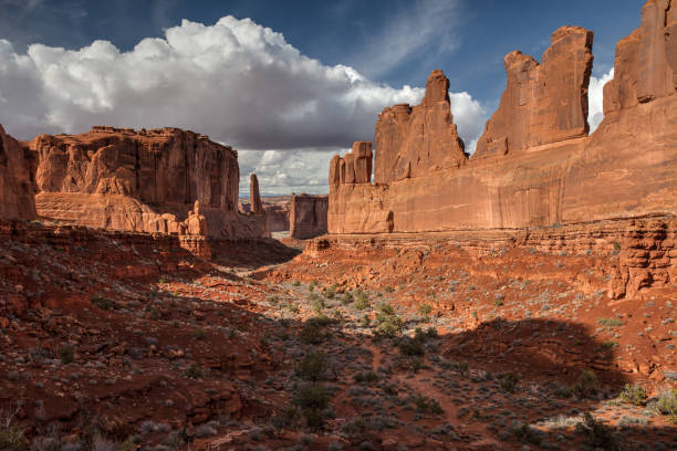 istock Park Avenue Sandstone Walls and Afternoon Clouds 1208710375