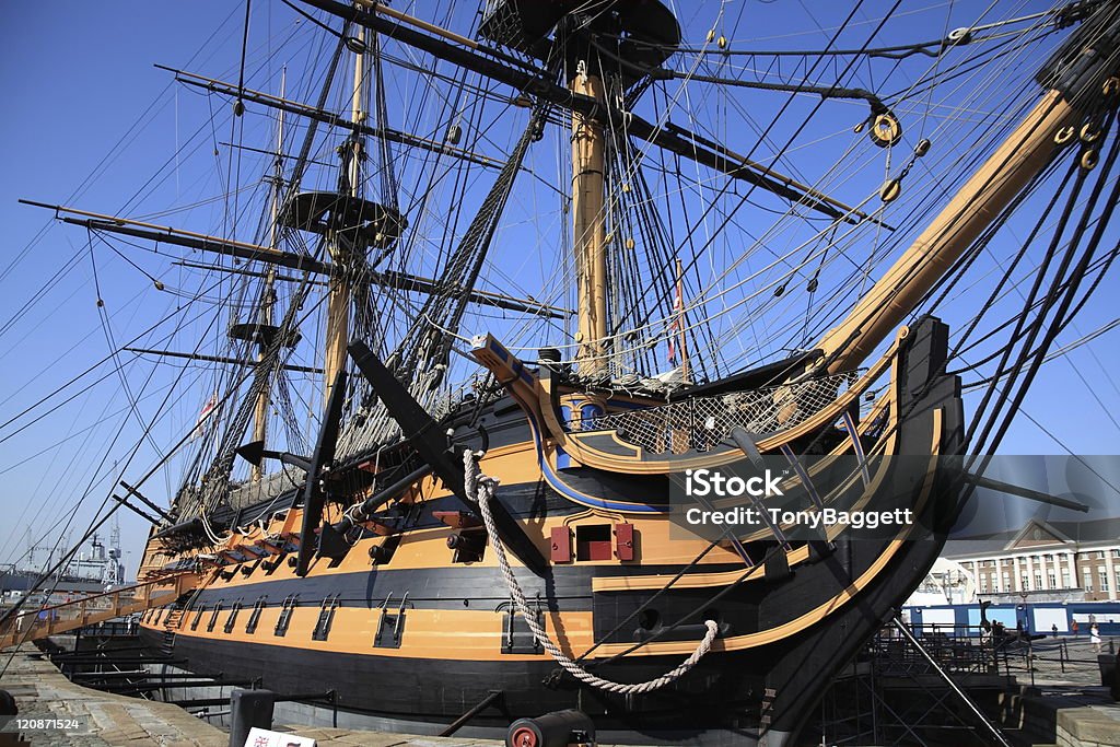 HMS Victory HMS Victory was Admiral Horatio Nelson's flagship at the Battle of Trafalgar in 1805 during the Napoleonic Wars. She is currently in a dry dock at Portsmouth, England serving as a major tourist attraction for the city Portsmouth - England Stock Photo